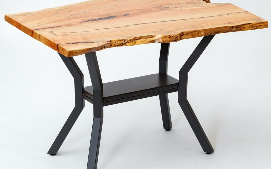 Morris Hill Metal Craft Quarryville, PA A side table made from a slab of wood.
