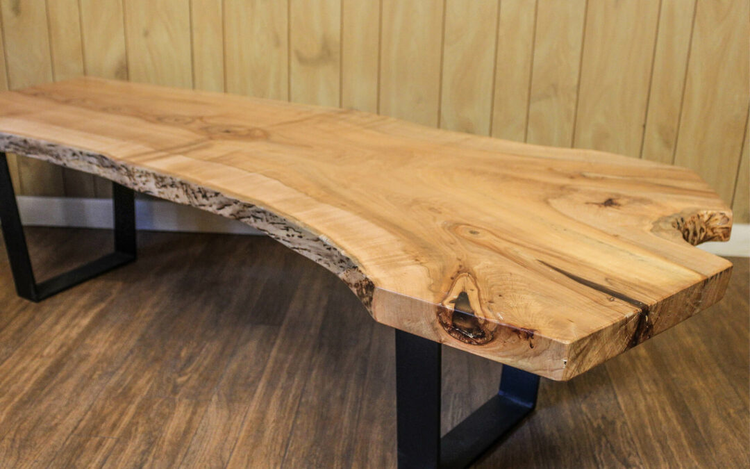 Morris Hill Metal Craft Quarryville, PA A table made from a large slab of wood.