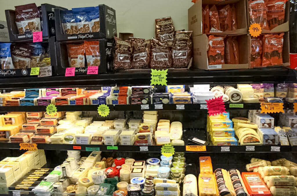 Willow Creek Discount Grocery Reinholds, Denver PA A selection of cheeses on display in a grocery store.