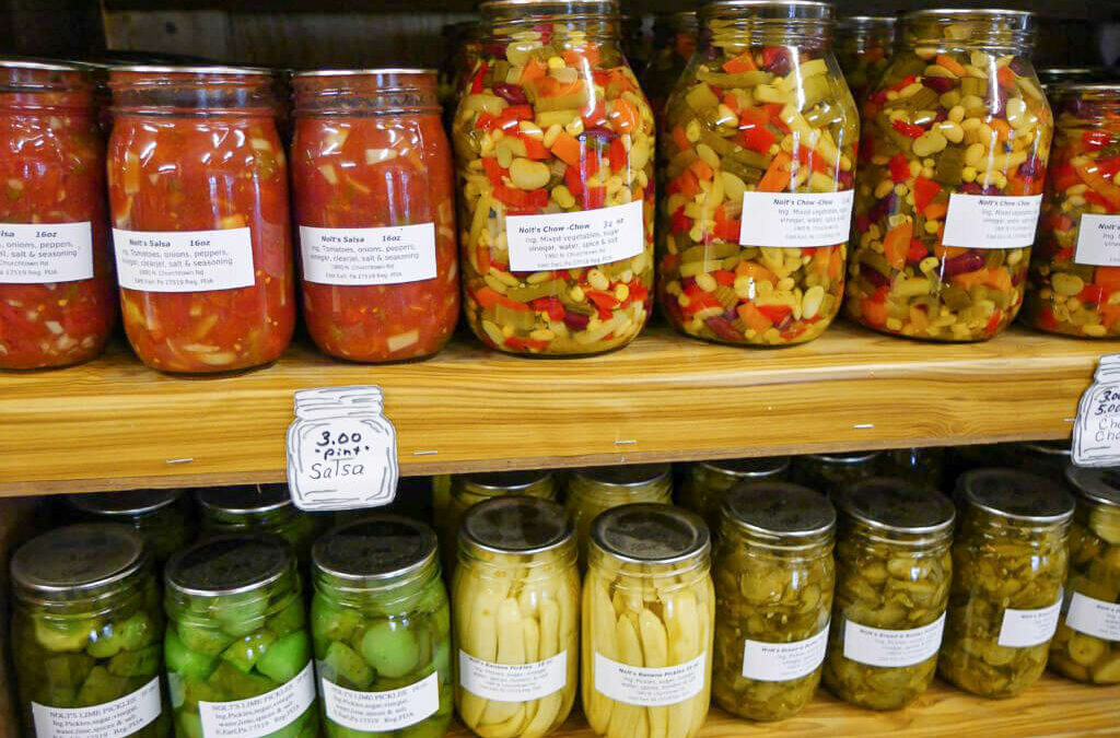 Wayside Produce East Earl PA Jars of pickled canned goods on shelves in a farm market