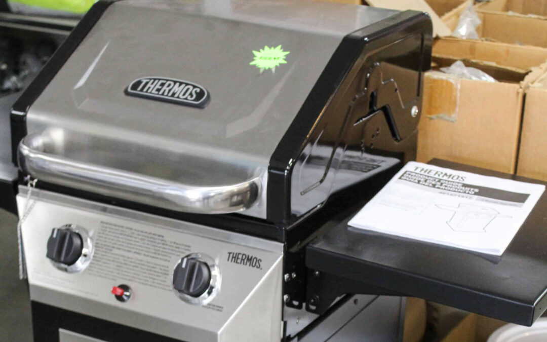 Slate Road Supply Ephrata PA A new thermos grill in a warehouse environment with instruction manual on the side shelf.