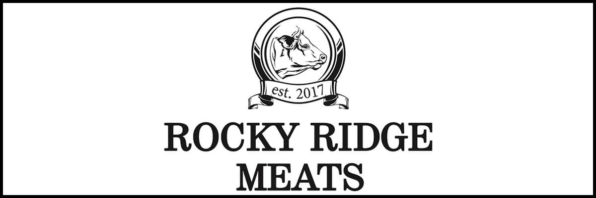 Logo for Rocky Ridge Meats featuring a cow head inside a circle and a banner reading 