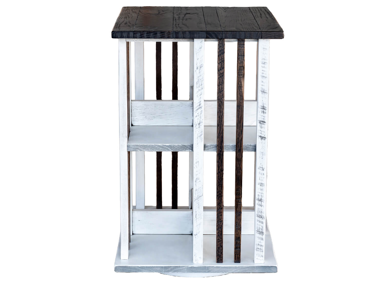 7.8.26 Spring Valley Woodworking Accessories Gallery 5 A narrow wooden bookshelf with a dark top, white sides, and dark vertical slats, featuring three shelves and a textured, rustic finish.