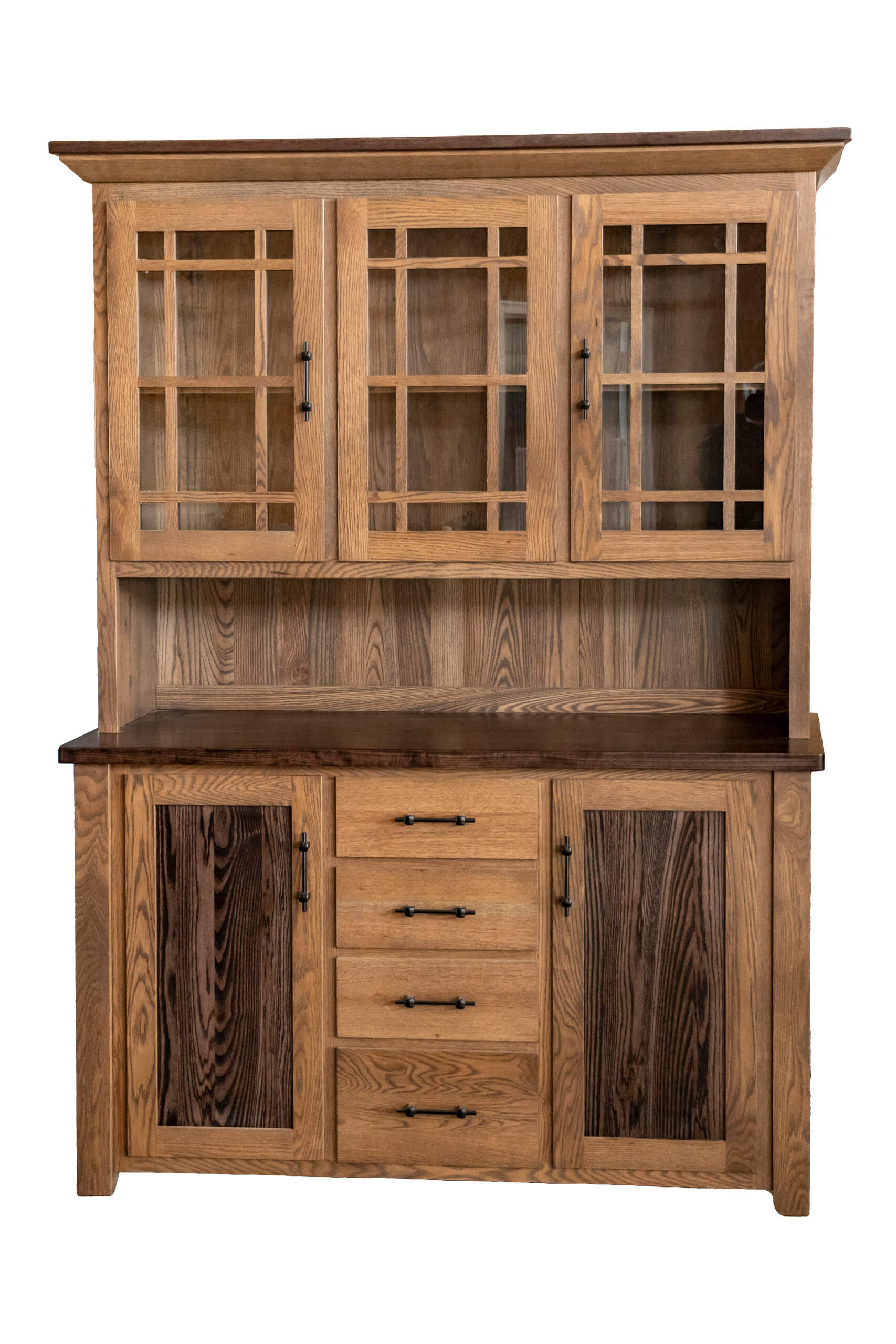 7.8.26 Spring Valley Woodworking Cabinets, Hutches, and Storage Gallery 12 A wooden hutch with glass-paneled upper cabinets, four center drawers, and two solid lower cabinet doors, all with decorative metal handles.