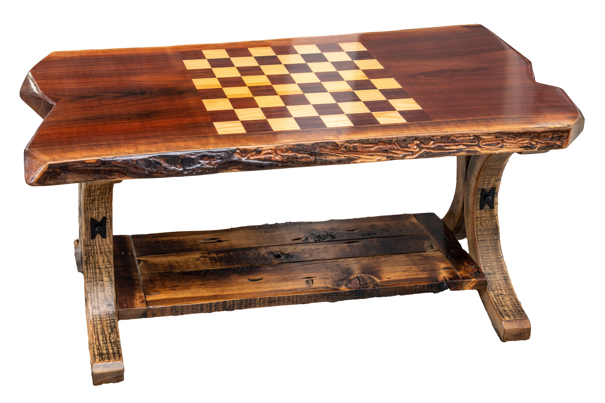 7.8.26 Spring Valley Woodworking Tables Gallery 4 A rustic wooden coffee table with a built-in chessboard on the tabletop and a lower shelf for storage.