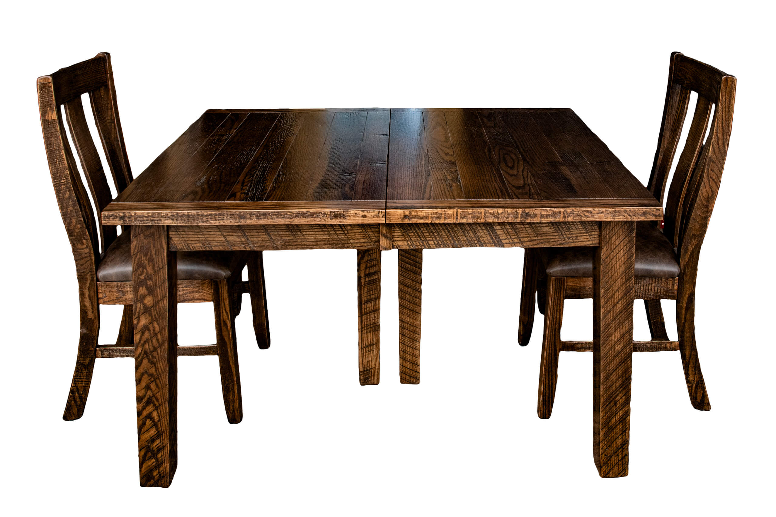 7.8.26 Spring Valley Woodworking Tables Gallery 9 A wooden dining table with a dark finish and two matching wooden chairs, all positioned on a white background.