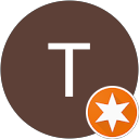 T J